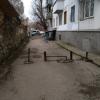 Вкопанные трубы возле дома 12А улицы Кирова