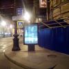 Вид перегороженного рекламой тротуара