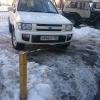Белый внедорожник г/н М946ер 125 рус
