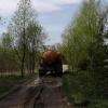 И опять разбитая дорога. В день проезжает по три, четыре камаза.