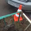 На фото пристегнутый конус и номер авто владельца конуса